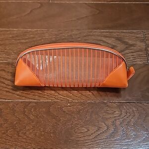 Orange mesh and pencil/make up case